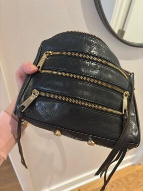 Rebecca Minkoff Black Leather moto purse with gold zipper, gold studs